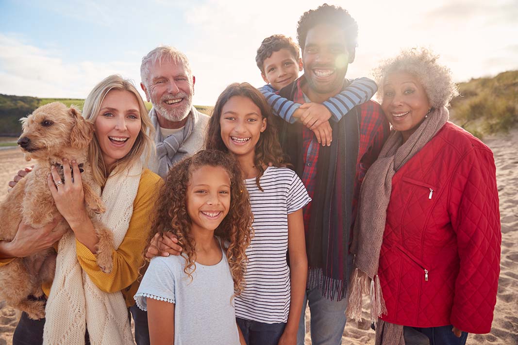 Family photo of kids, parents, and grandparents who all benefit from aligners from their orthodontist near Evanston