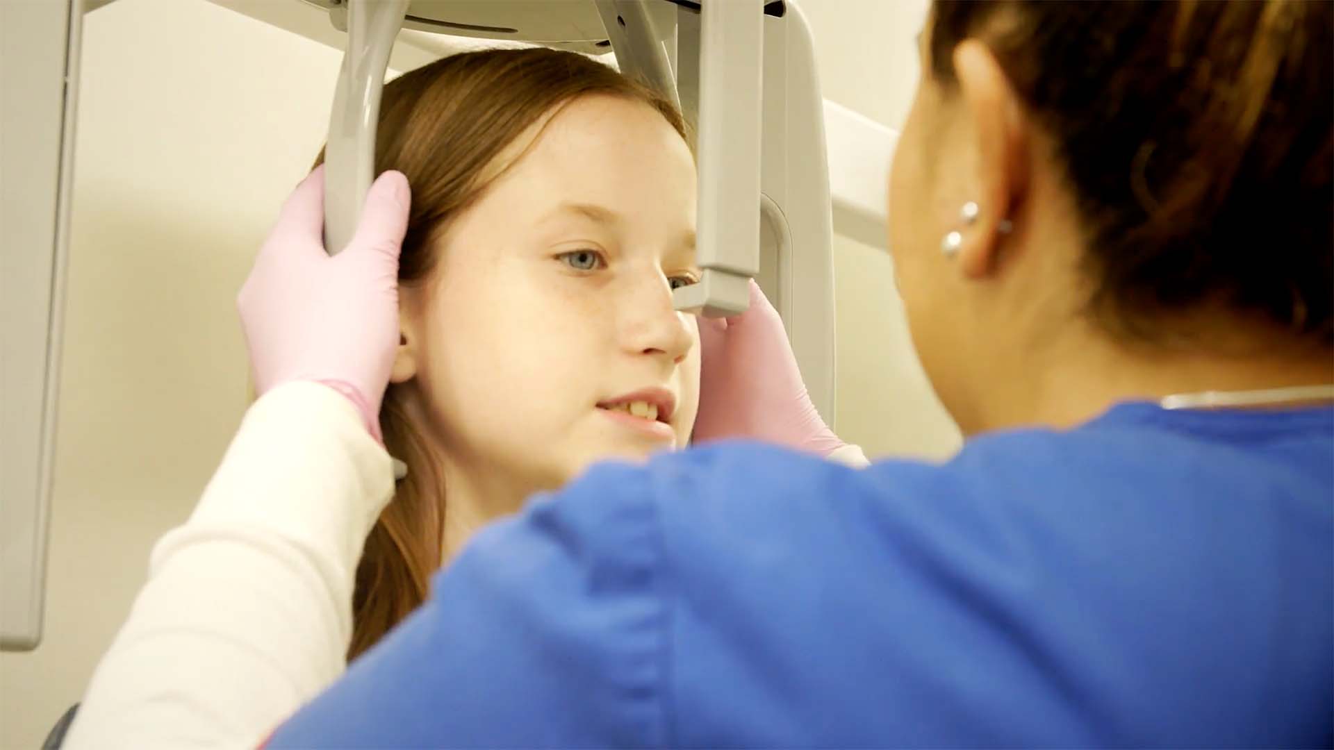 Patient gets her x-rays taken during her initial orthodontic appointment