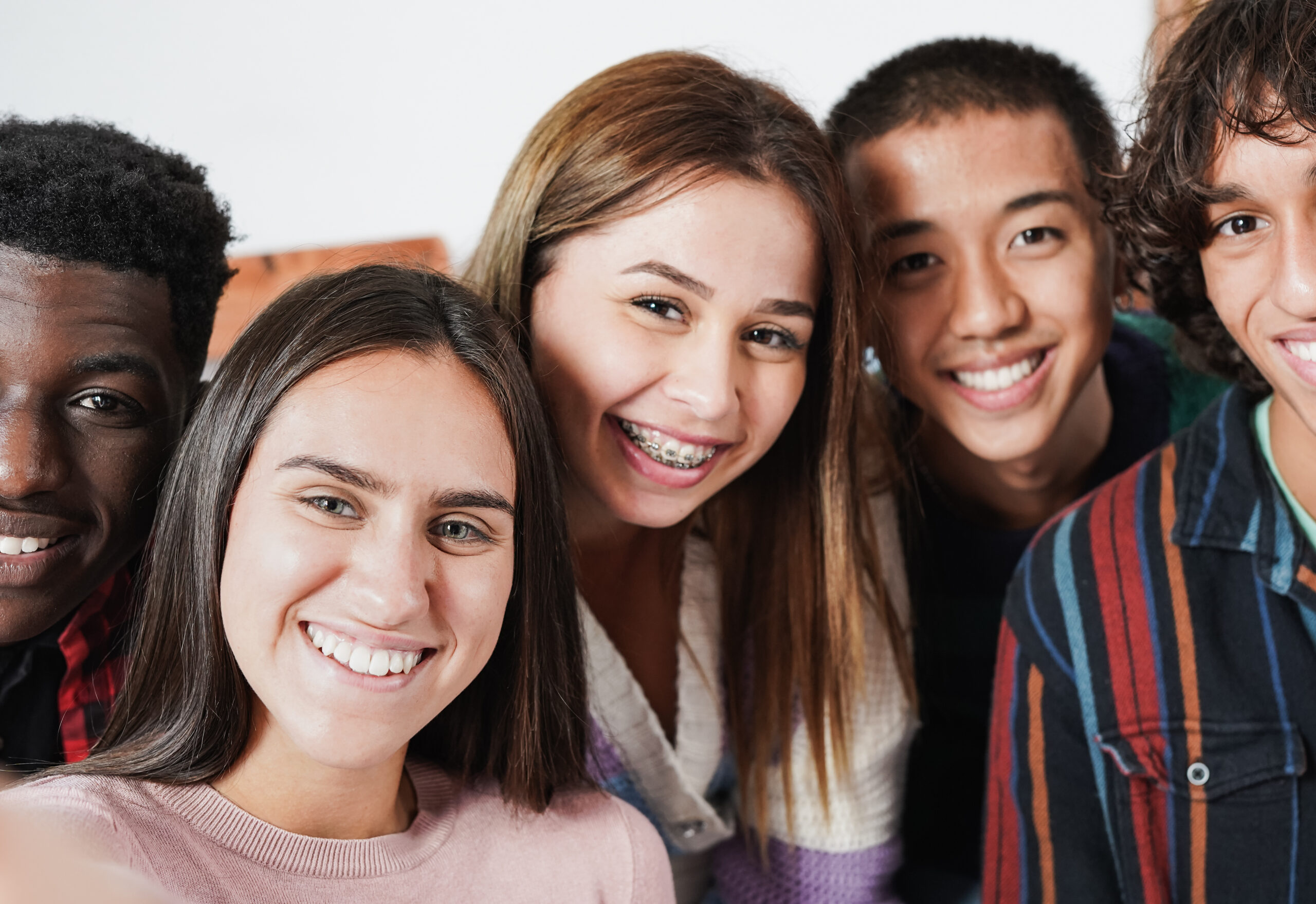 Braces and self confidence in teens is on display with these teen smiles